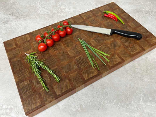 Cast and Wood Handmade Extra Large Wooden Chopping Board, Chunky butchers block style - Made from Oak / Sapele end grain hardwood - in use