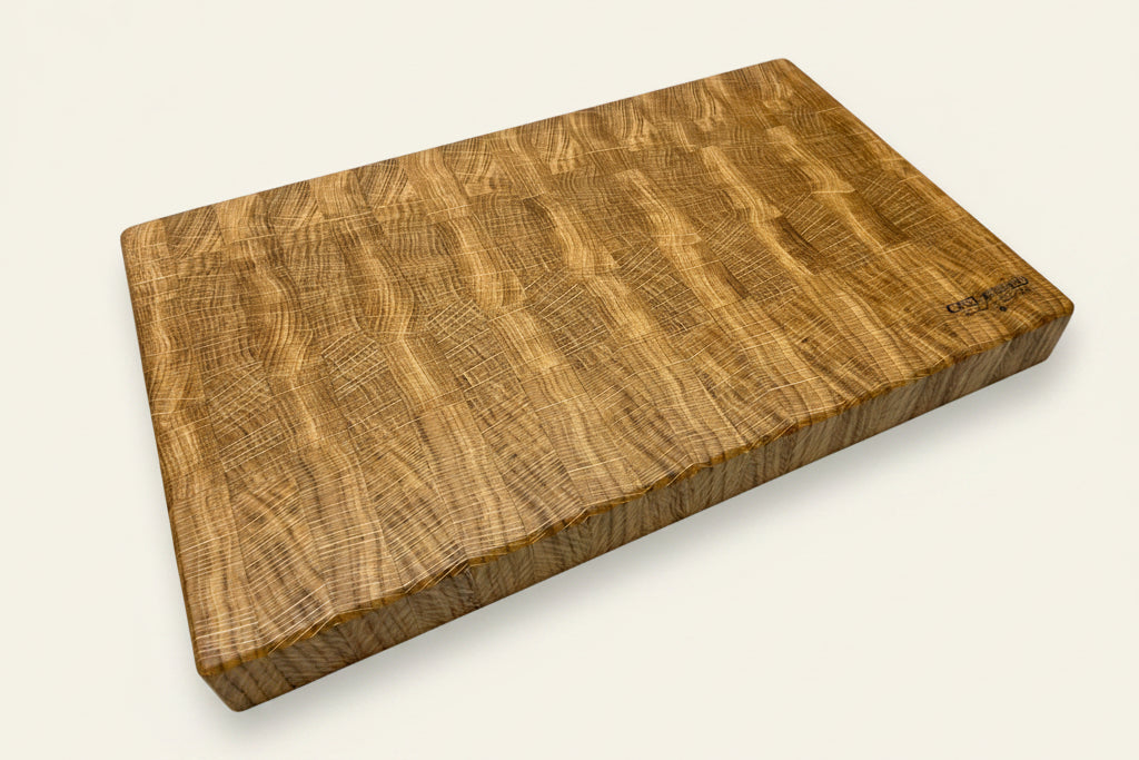 Large Heaton end grain chopping board with smooth surface and textured grain pattern, presented on a neutral background.