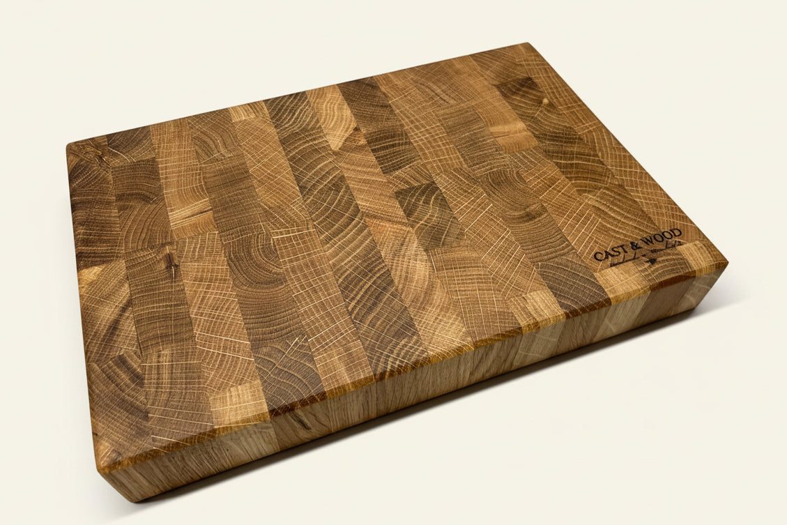 Rectangular Heaton Medium End Grain Chopping Board with a patterned surface and smooth finish, showcasing light and dark wood tones.
