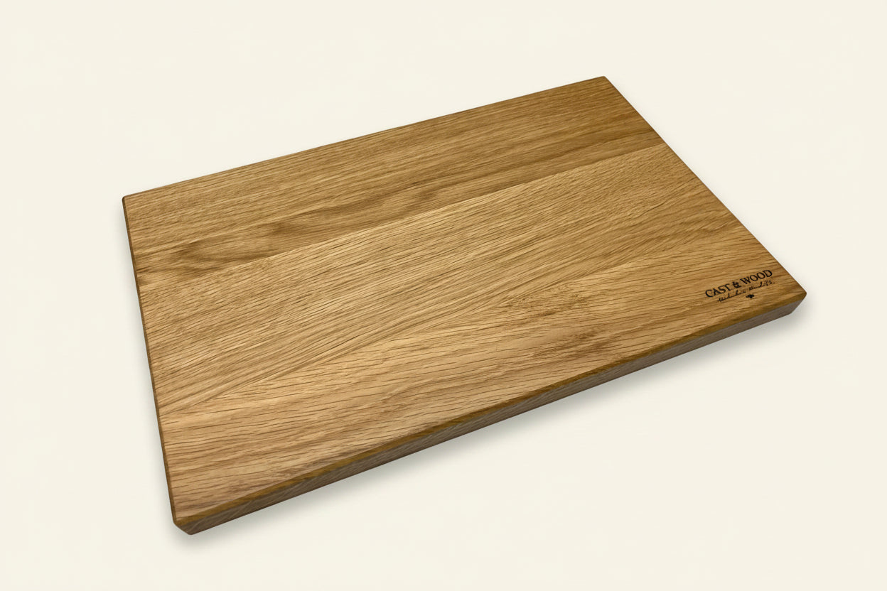 Wooden chopping board with smooth surface, natural grain pattern, and rounded edges from the Piccadilly Chopping Board set.
